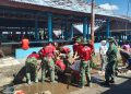Satgas Yonif 123/RJW Bersama Warga Gelar Karya Bhakti Bersihkan Pasar Baru Distrik Obaa