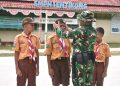 Satgas Pamtas RI-Malaysia Yonarmed 19/Bogani Tanamkan Disiplin dan Jiwa Kepemimpinan kepada Pelajar SMPN 1 Entikong