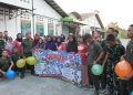 Prajuti Yonif TP 449/SH Larut Dalam Kecerian Lomba 17-an Bersama Warga