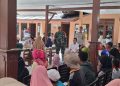 Babinsa dan Bhabinkamtibmas Kawal Penyaluran Bantuan Beras