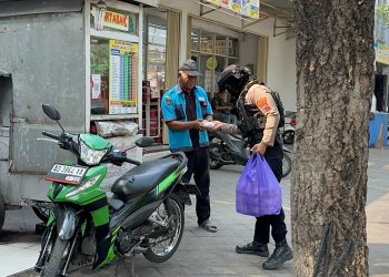 Jumat Berkah Tim Sparta Polresta Surakarta, 150 Kotak Makanan Dibagikan untuk Warga yang Membutuhkan